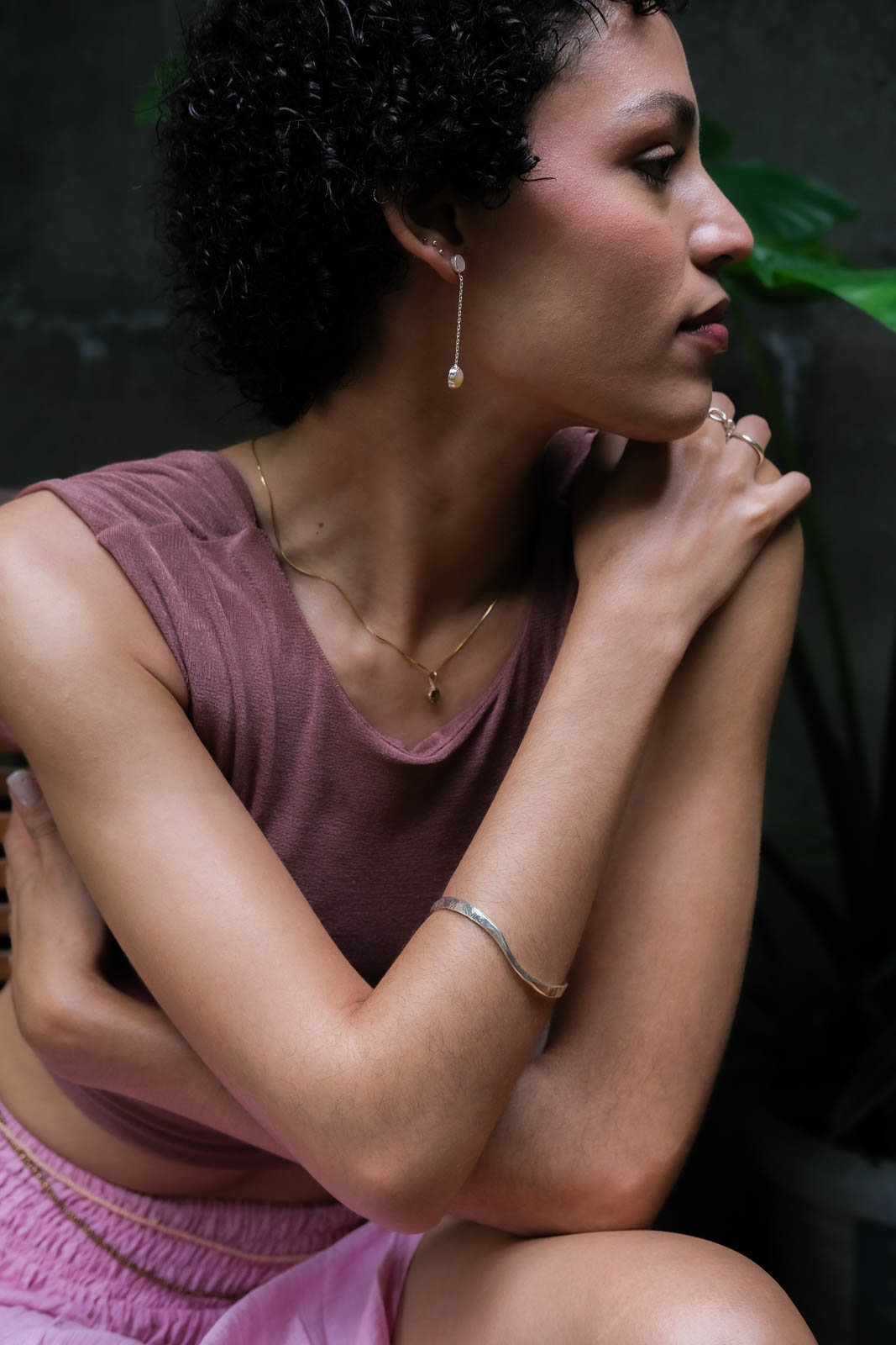 A model wearing Soulcraft Jewelry made from .999 silver.